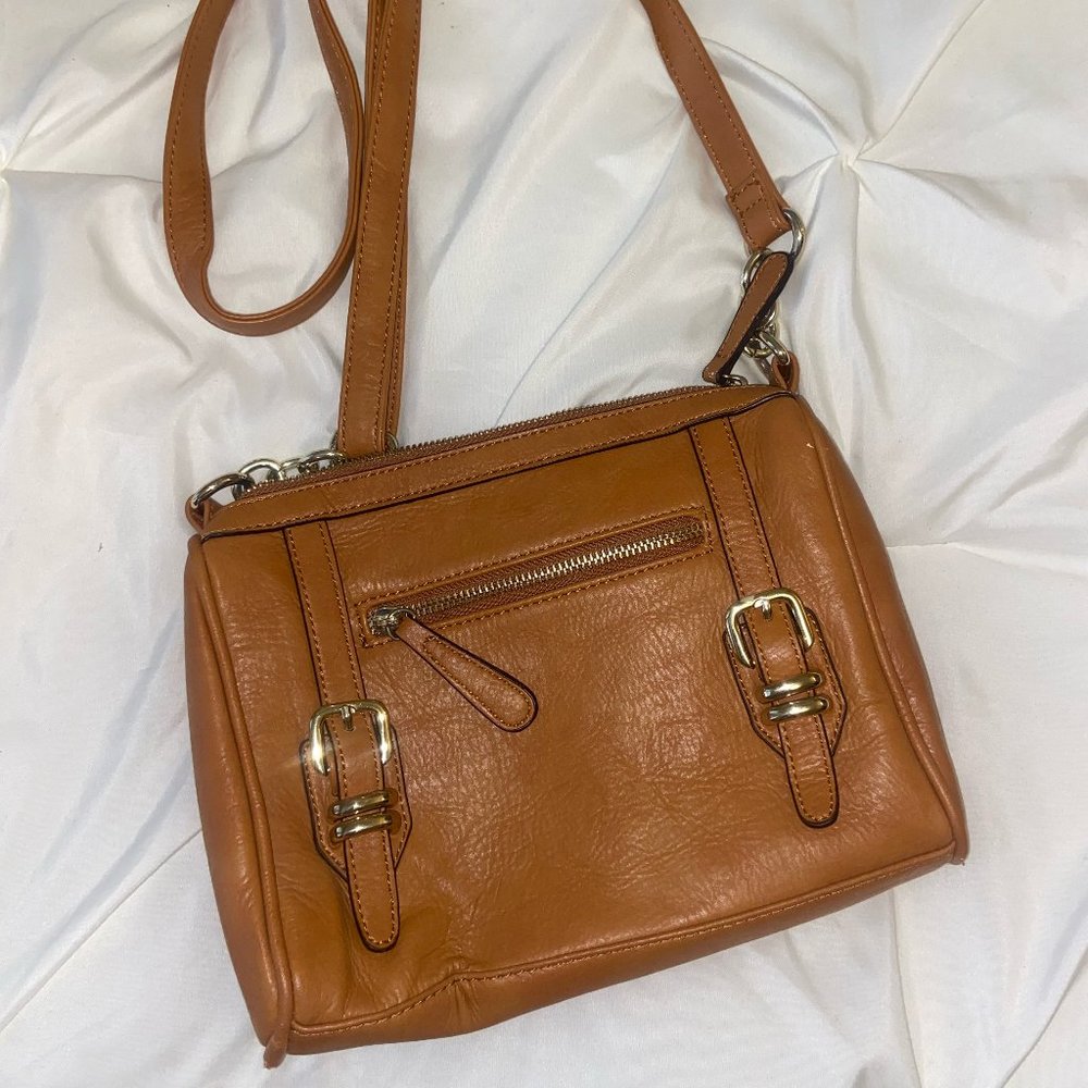 Charming Charlie adjustable tan cross body bag